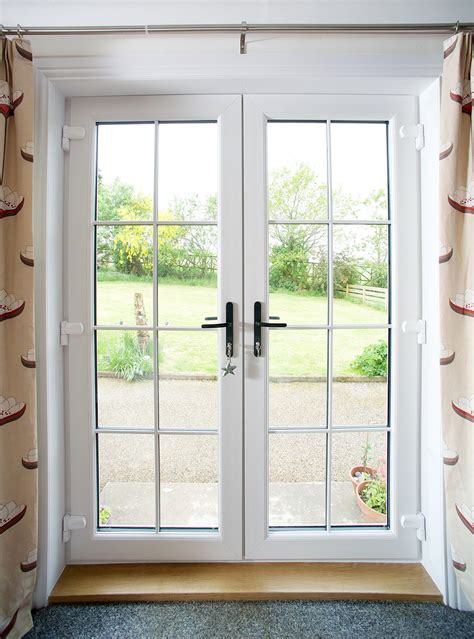 cost to convert double window into french doors
